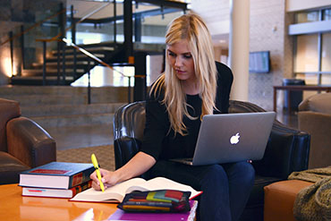Law school student Cameron Housley serves as a law clerk at the Fayetteville City Prosecutor’s Office and plans to pursue a career in criminal law. Photo McGee Clopper