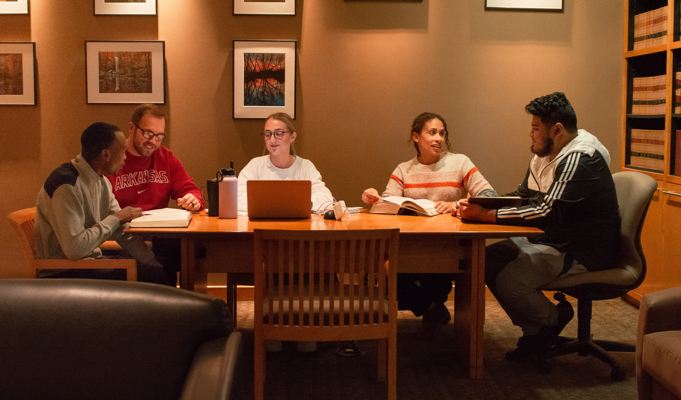 students around a table studying for the bar exam