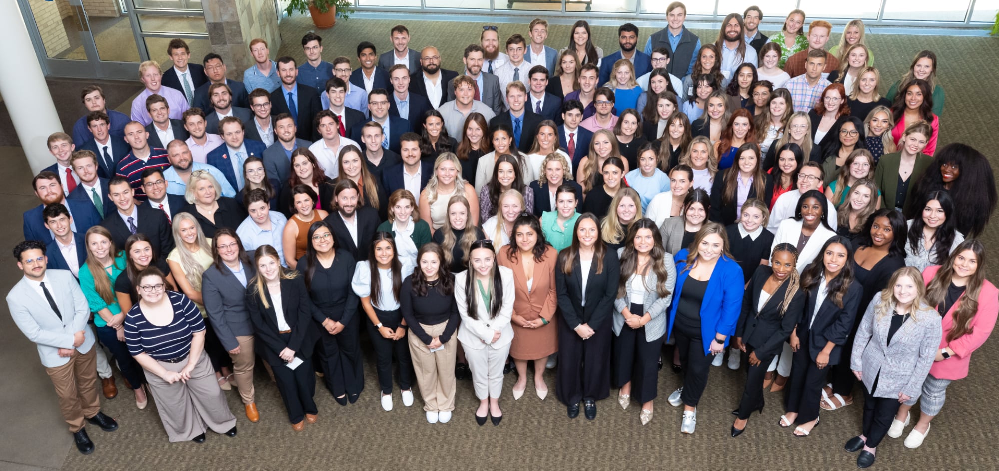 Law students gathered in the courtyard for a group photo