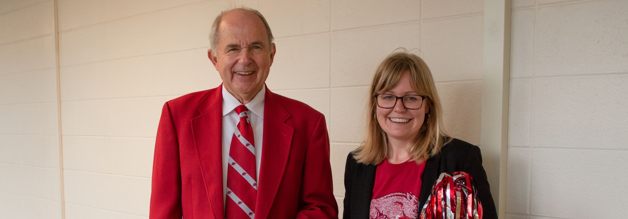 Profs. Brill and Bullock dressed in Razorback best for Spirit Week 2021